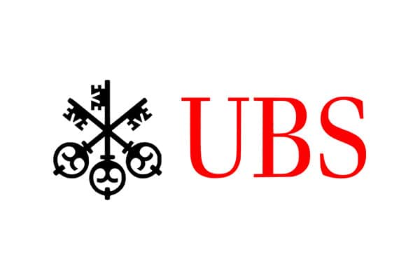 Das Bild zeigt das UBS-Logo mit drei ineinander greifenden schwarzen Tasten auf der linken Seite und den Buchstaben UBS in fetter roter Schrift auf der rechten Seite, alles auf weissem Hintergrund.