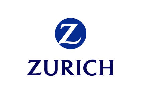 Das Logo der Zürich Versicherung mit einem fetten, weißen Buchstaben Z in einem blauen Kreis über dem Wort ZURICH in blauen Großbuchstaben auf weißem Hintergrund.